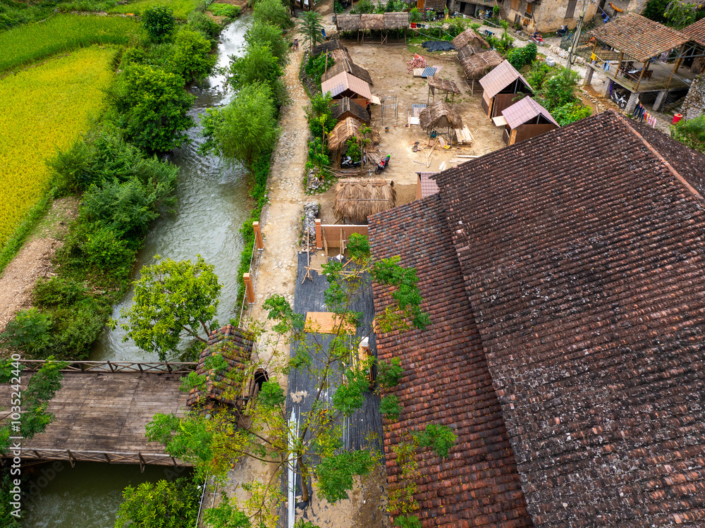 Aerial view of an ancient rock village in Trung Khanh, Cao Bang, Vietnam. Khuoi Ky old village of the Tay ethnic group. Aerial view of an ancient rock village in Trung Khanh, Cao Bang, Vietnam. Khuoi Ky old village of the Tay ethnic group.