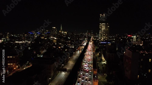 Wallpaper Mural Traffic on the highway and New York skyline - drone footage at night Torontodigital.ca