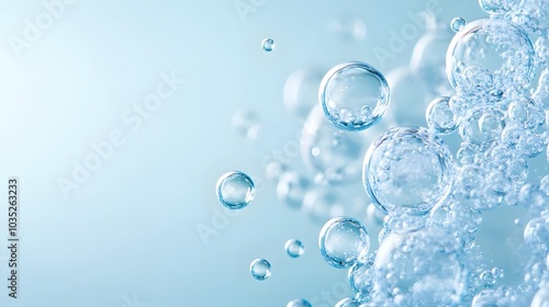 Close-up of Translucent Water Bubbles Against a Light Blue Background