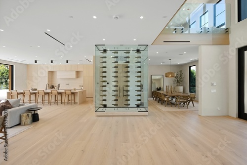 Modern open-plan living space with wine rack.