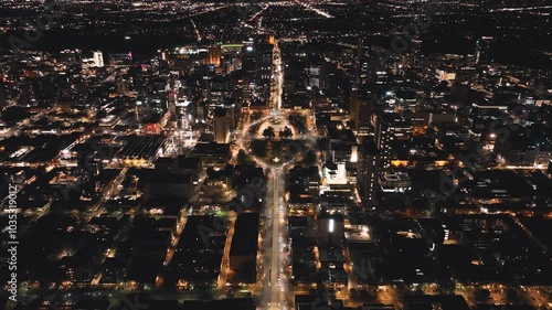 Wallpaper Mural Aerial view of vibrant city skyline at night with illuminated buildings and bustling streets, Adelaide, Australia. Torontodigital.ca