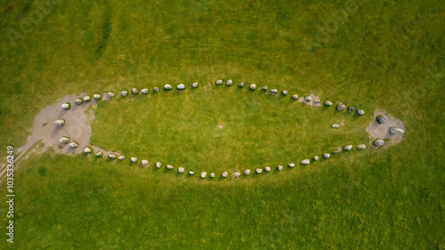 Aerial view of ales stenar stone monument in a tranquil meadow, ystad, sweden.