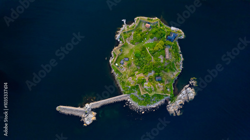 Aerial view of a small island with a pier and historic karlshamn castle, karlshamn citadel, sweden. photo