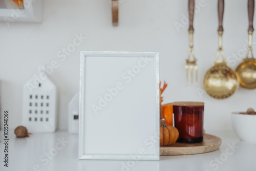Wallpaper Mural Simple white frame positioned on a kitchen counter with seasonal decorations and utensils in view Torontodigital.ca