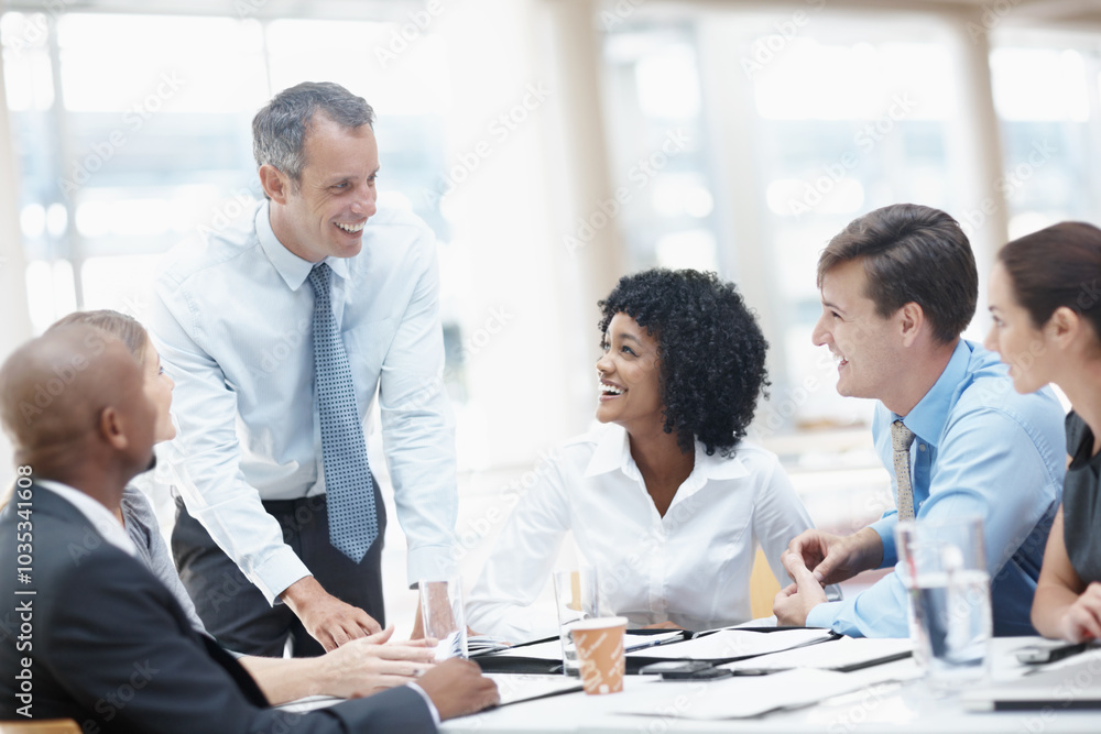 Businessman, presentation and collaboration with team for meeting, corporate plan or project at office. Man, executive or speaker talking to group of employees for business improvement or development Businessman, presentation and collaboration with team for meeting, corporate plan or project at office. Man, executive or speaker talking to group of employees for business improvement or development