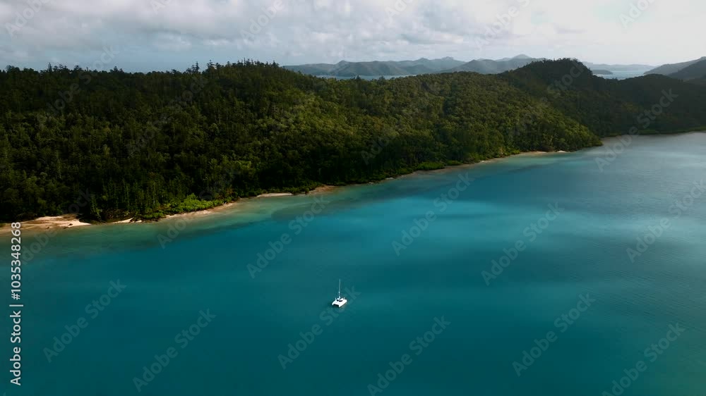 Aerial view of beautiful islands and serene ocean with boats, Whitsundays, Queensland, Australia. Aerial view of beautiful islands and serene ocean with boats, Whitsundays, Queensland, Australia.