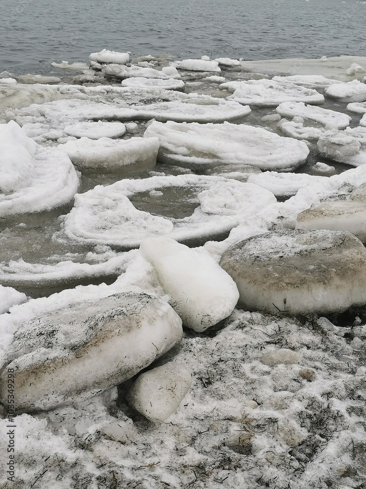 Winter sea coast landscape with frozen iced rocks Winter sea coast landscape with frozen iced rocks