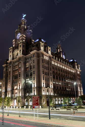 The royal liver building illuminating the night in liverpool photo