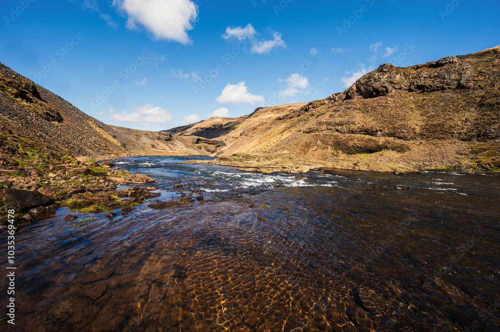 iceland, thorufoss waterfall views during a sunny day iceland, thorufoss waterfall views during a sunny day