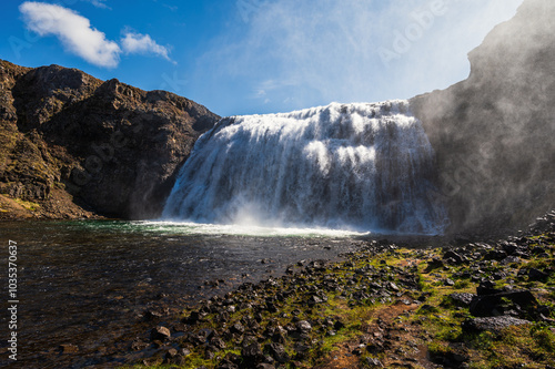 iceland, thorufoss waterfall views during a sunny day photo