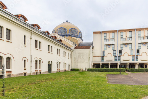 Vichy, France - May 1, 2024: Historic building with beautiful domein Vichy in France photo