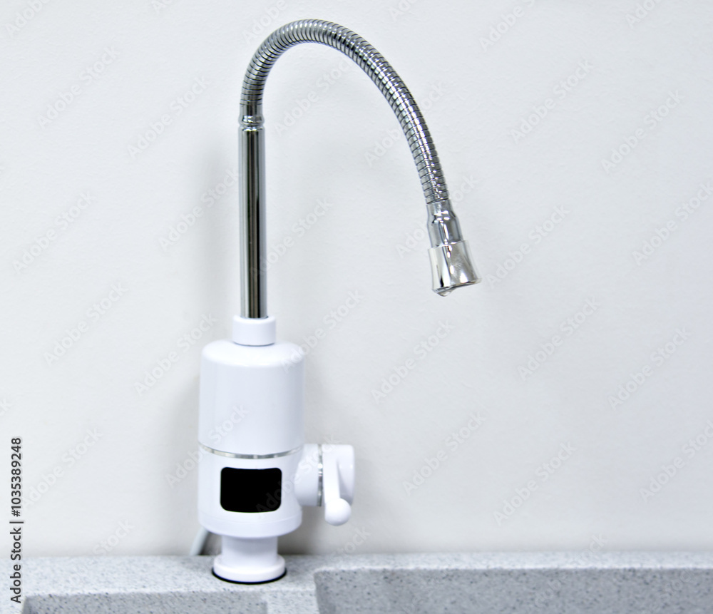 Chrome faucet with modern sink Chrome faucet with modern sink