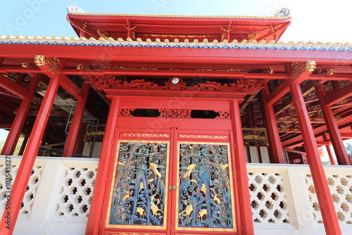 Phra Thinang Aisawan Thiphya-Art: A traditional Thai-style pavilion located in the center of an artificial lake. photo