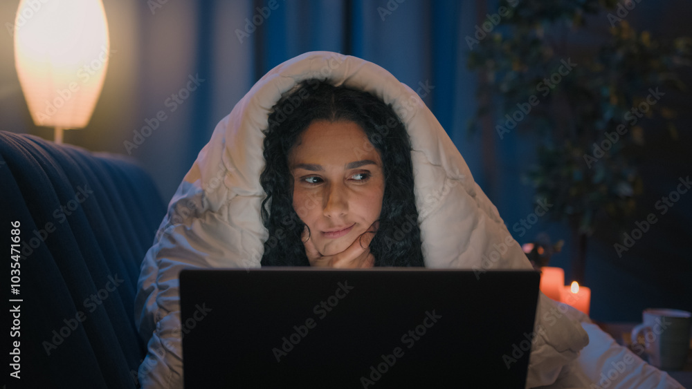 Tired girl insomnia woman Indian Arabian female worried failure pensive with laptop working deadline studying computer addiction thinking problem solution think idea sleep disorder night under blanket Tired girl insomnia woman Indian Arabian female worried failure pensive with laptop working deadline studying computer addiction thinking problem solution think idea sleep disorder night under blanket