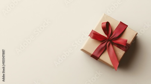 Wallpaper Mural A gift box tied with a simple red ribbon, resting on a plain white background  Torontodigital.ca