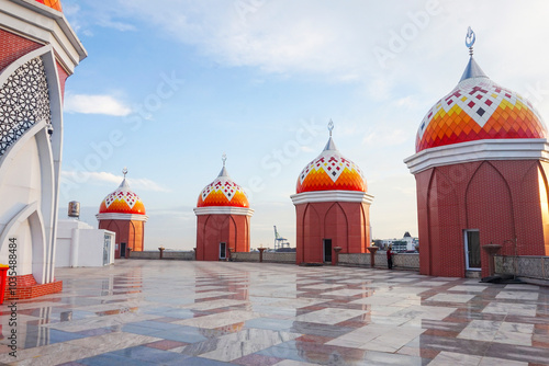 View of the 99 dome mosque in a sunny morning Makassar Indonesia photo