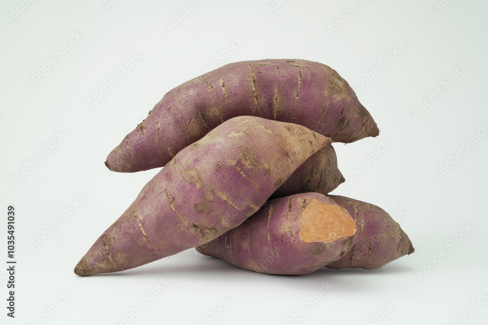 Fresh Sweet Potatoes on Pristine White Background Fresh Sweet Potatoes on Pristine White Background