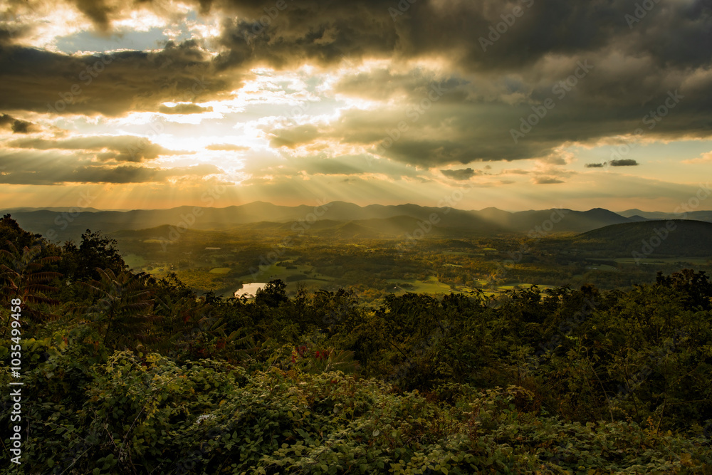 View of colorful autumn landscape with mountains and valley under a scenic sky, Shenandoah National Park, Virginia, United States. View of colorful autumn landscape with mountains and valley under a scenic sky, Shenandoah National Park, Virginia, United States.