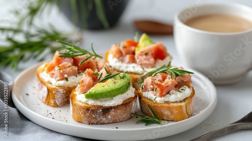 An elegant breakfast scene, Bruschettas with tuna, cream cheese, avocado, rosemary leaves, and a cup of latte, set on a white plate with a minimalist background.