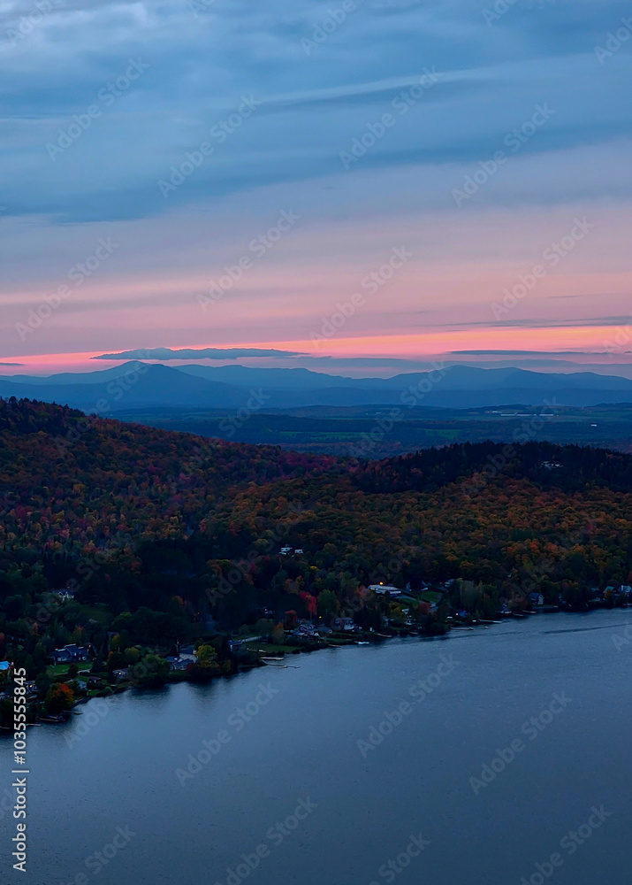 Fototapeta premium Beautiful colorful sunset over the mountains in autumn, fall foliage 