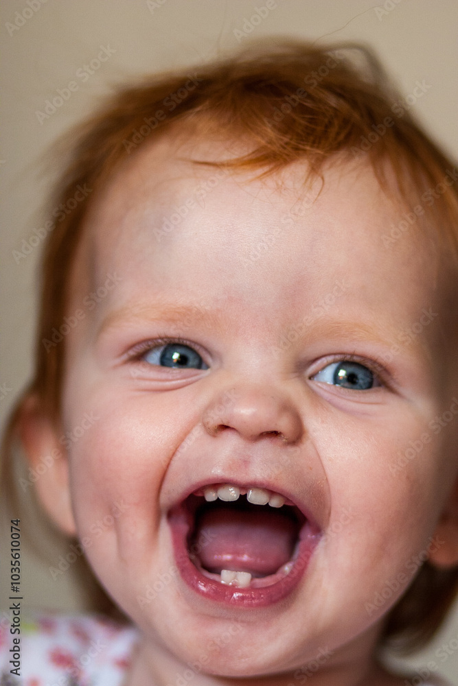 A cheerful and happy infant radiating pure joy with a wide smile and sparkling, bright blue eyes full of wonder A cheerful and happy infant radiating pure joy with a wide smile and sparkling, bright blue eyes full of wonder