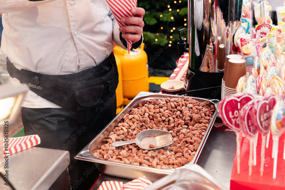 Sugared almonds. Candied sugar coated almond nuts sold at a Christmas fair market.