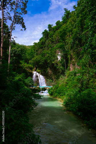 Cebu, Philippines. August 23, 2024. Turquoise waters rushing from the Kawasan Falls.