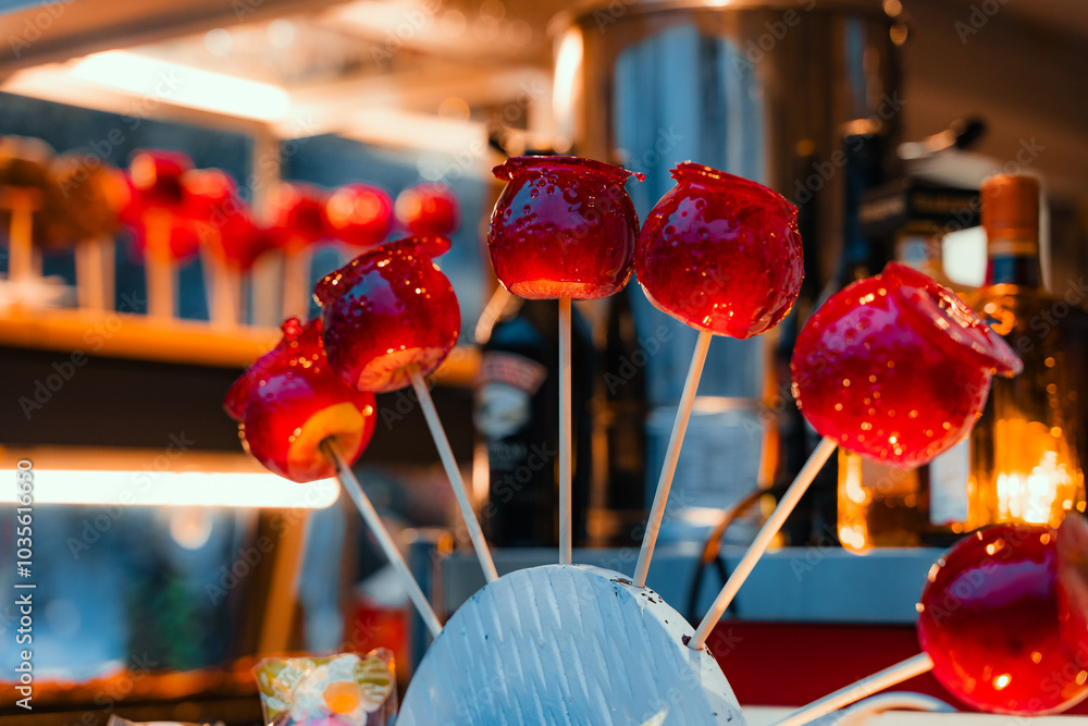 Red caramelized glazed apples decorated on Christmas market in Copenhagen.