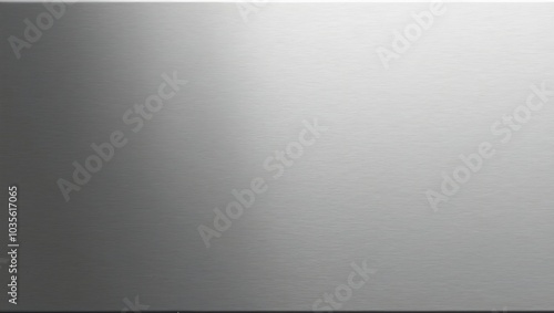 Brushed stainless steel close up with soft matte finish and subtle horizontal lines reflecting light photo