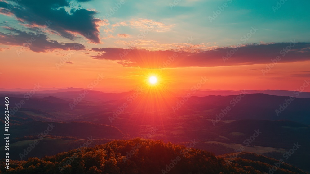 Fototapeta premium Stunning sunrise over the mountains with vibrant colors filling the sky.