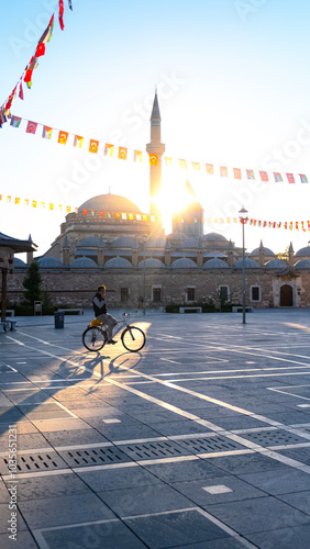 Life continues in Konya city center while the sun has just risen. View of the city's landmarks and Mevlana tomb photo