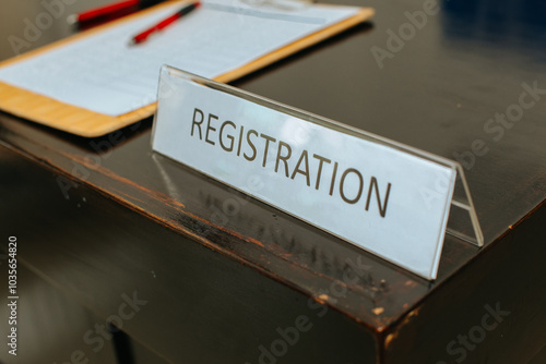 registration desk in front of conference, selective focus