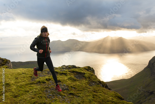 Trail runner running in sunset