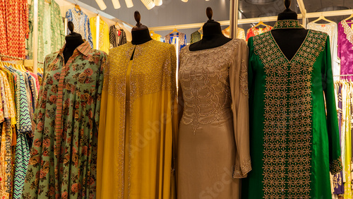 Traditional Arabic Abaya and Clothing for Sale at Souq Waqif Cloth Store photo