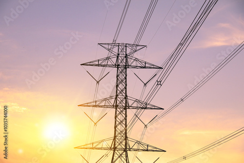 High Voltage Power Transmission Tower at Sunset, Energy Infrastructure, Electricity Supply, Industrial Powerlines