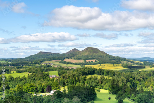 Panoramic westerly view from Scott's View near Melrose, UK over landscape near Scottish Borders, overlooking the valley of the River Tweed and the three peaks of the Eildon Hills photo