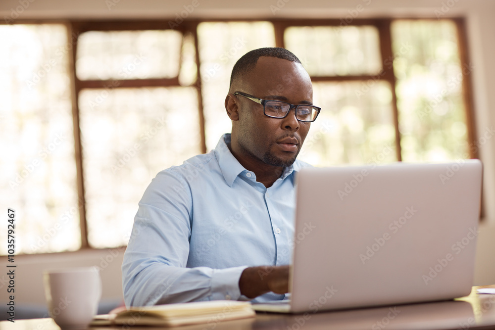 Black man, glasses and laptop for remote work at house with financial planning, review budget and schedule. Person, typing and online for accounting, audit report and investment funding with project