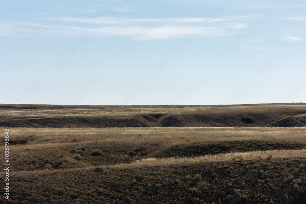 Bathed in the warm glow of golden hour, Montana’s rolling hills and vast prairie unfold in soft light, showcasing the tranquil beauty of the high plains. Bathed in the warm glow of golden hour, Montana’s rolling hills and vast prairie unfold in soft light, showcasing the tranquil beauty of the high plains.