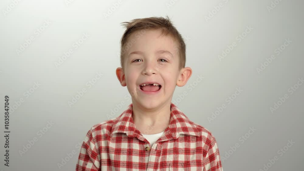 portrait of a child boy with emotions of joy. a cheerful, playful, cute child. portrait of a child boy with emotions of joy. a cheerful, playful, cute child.