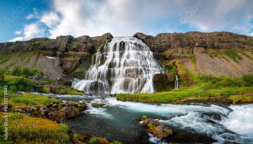 dynjandi is one the most famous waterfall of the west fjords of iceland at summer