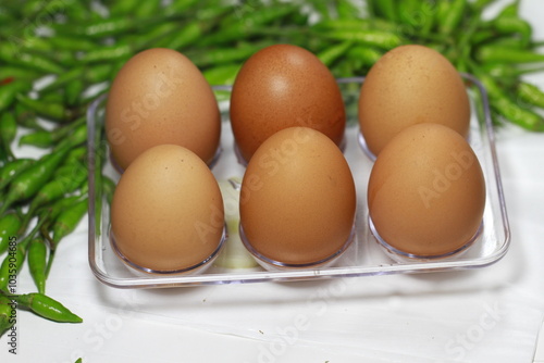 a few fresh chicken eggs 