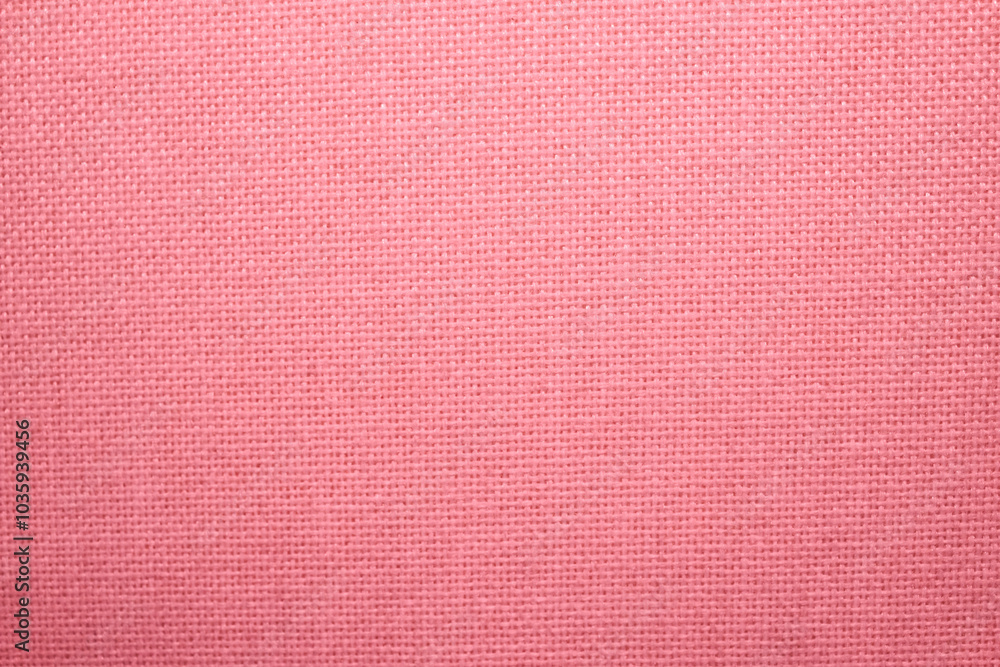 Fototapeta premium Woven fabric texture. Pink material texture. Close-up photograph jpg.