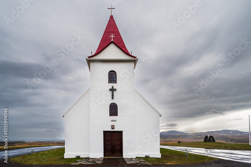 ingjaldsholskirkja church with a cloudy sky in the background on the Snaefellsness Peninsula, Iceland photo