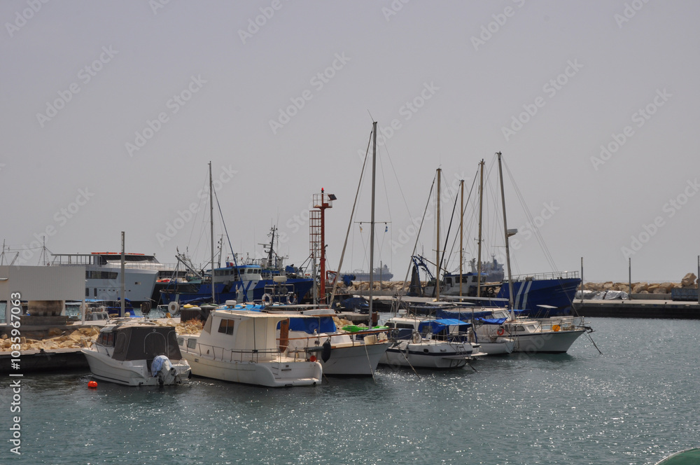 Fototapeta premium The Limassol Old Port with fishing boats and beautiful buildings in Cyprus