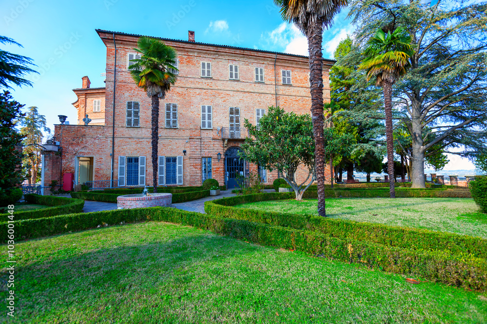 Fototapeta premium View of the castle walls and Its garden of the village of Castell’Alfero (Italy, Piedmont Region, Asti Province). This area is world famous for its valuable red wines and is UNESCO Site since 2014.
