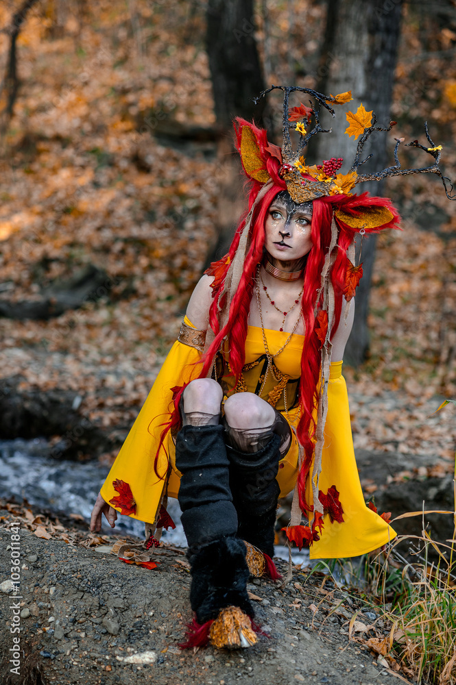 Deer girl in the autumn forest Deer girl in the autumn forest