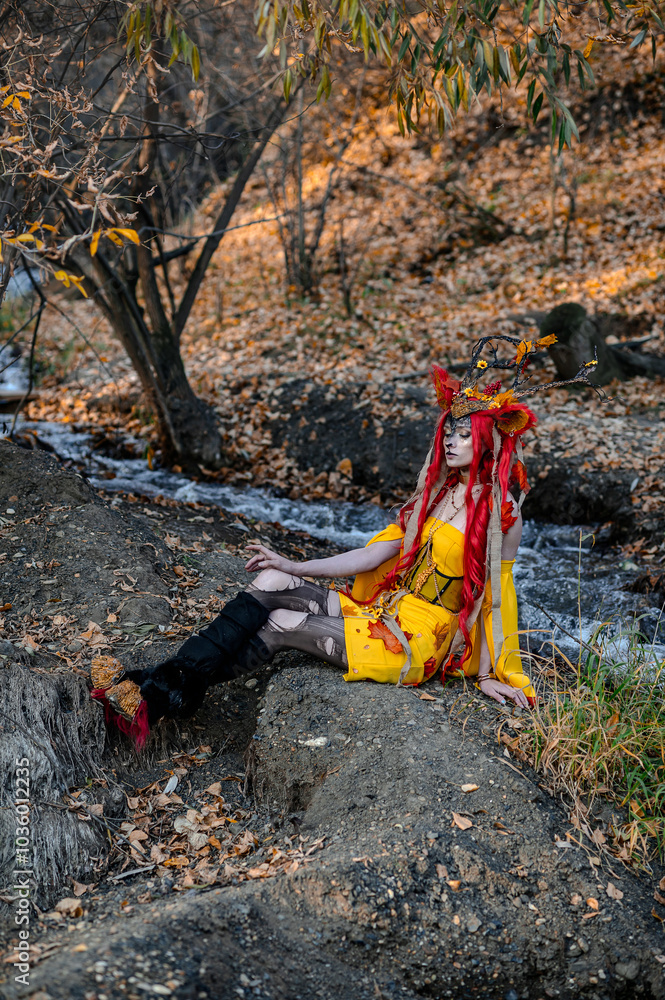 Deer girl in the autumn forest Deer girl in the autumn forest