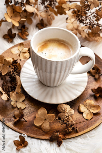 Coffee in mug on wooden tray, selective focus