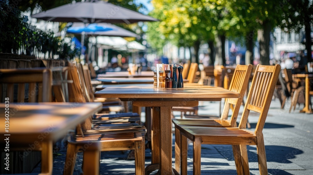 Obraz premium Outdoor Dining Area with Wooden Tables and Chairs