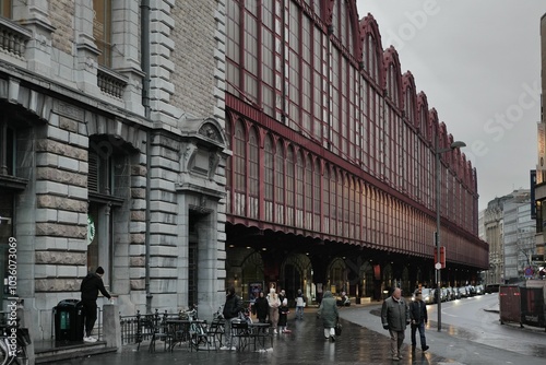 Fototapeta Naklejka Na Ścianę i Meble -  Street view of people walking near Anvers, Antwerpen, Central Train Station